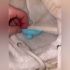 small white fuzzy sweatshirt with pockets